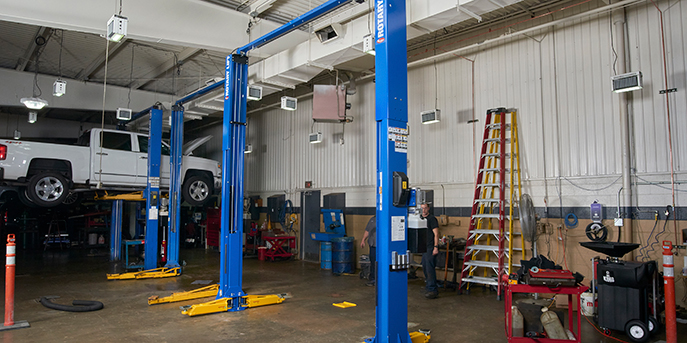 Garage with an installed two post automotive lift