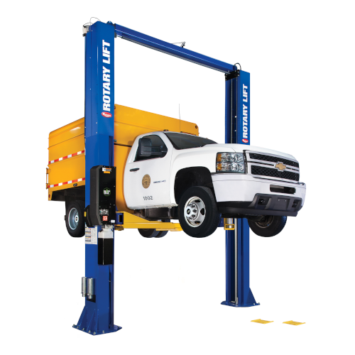 A blue Rotary SPO20 holding a pickup truck with a yellow trailer